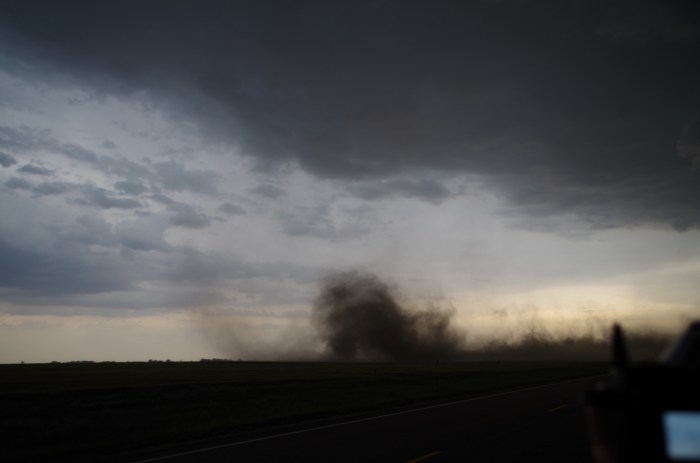 Sporadic gustnado appearing right in front of us!