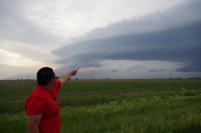 Me posing with the 11th Doctor's Sonic Screwdriver in front of the shelf cloud.