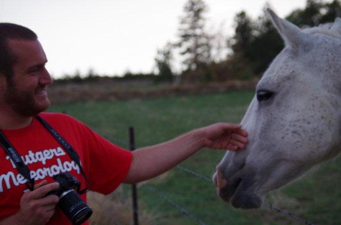 Matt DeLucia can't resist petting Mystery.