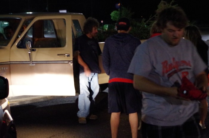 The grateful owner coming to pick up his lost dog.